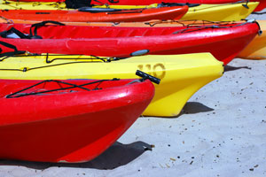 ocean kayaks on a Monterey, California beach