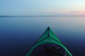 kayak on Devils Lake, North Dakota at sunset