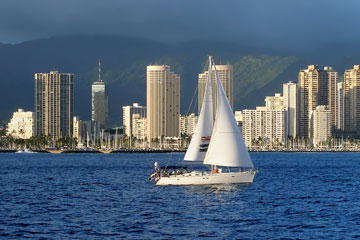 sailboat with Honolulu skyline in the background