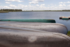aluminum canoes by the lake at McDowell Dam Recreation Area