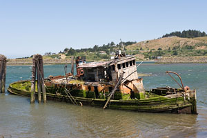 old, decrepit boat in the Rogue River